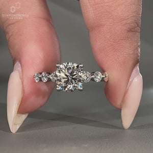 White gold diamond ring featuring a classic 4 prong setting.
