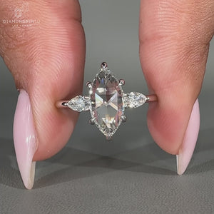 3 stone engagement ring symbolizing past, present, and future.
