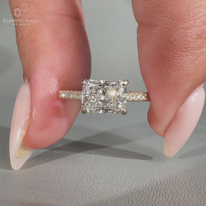 East to west diamond ring with a claw prong ring setting, offering a modern touch.
