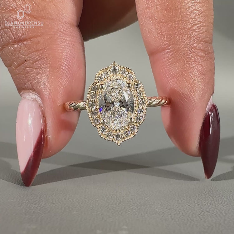 Vintage halo ring featuring classic charm.
