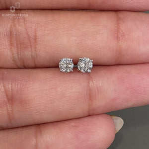 Classic diamond stud earrings crafted with precision and style.
