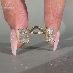2 stone radiant cut ring with curvy shape band for a modern look.
