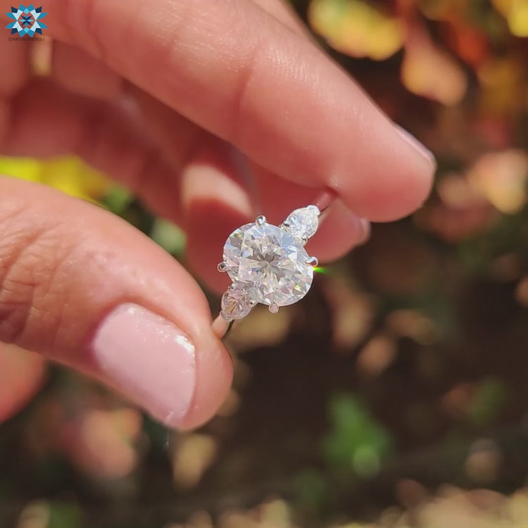 3 stone moissanite ring with brilliant sparkle.
