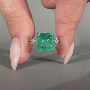 Tapered shank ring featuring a four tab prong design.
