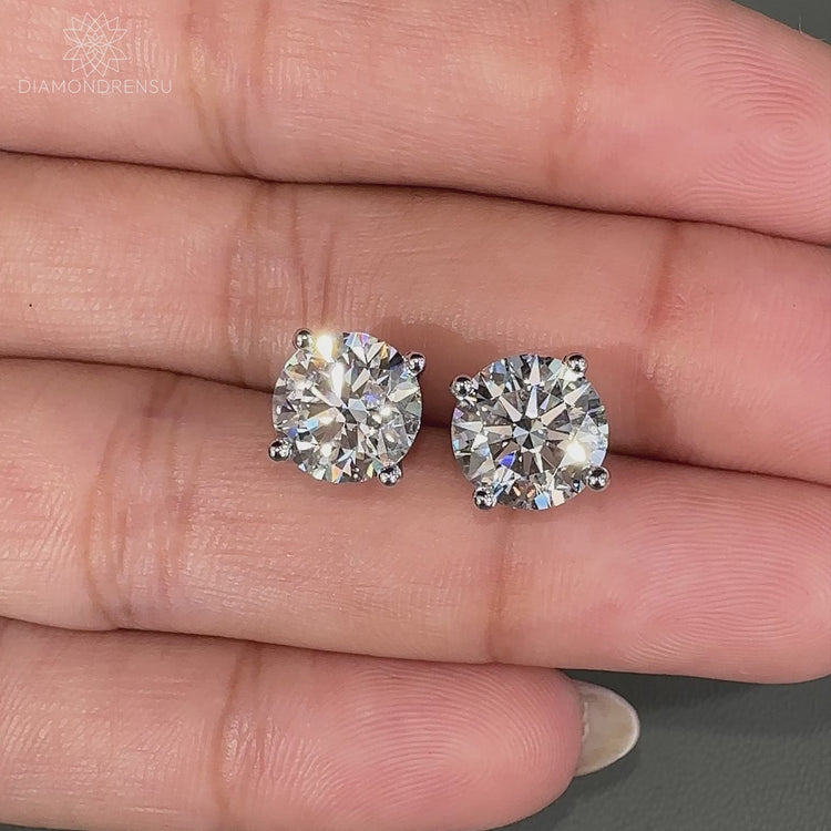 Stunning 4 carat diamond earrings in white gold for a timeless look.