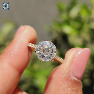 Round Old European Cut Ring set in yellow gold.
