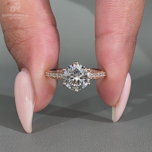 A rose gold ring featuring a hidden halo setting
