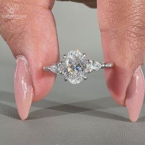 Oval shaped diamond ring set in a sleek band.
