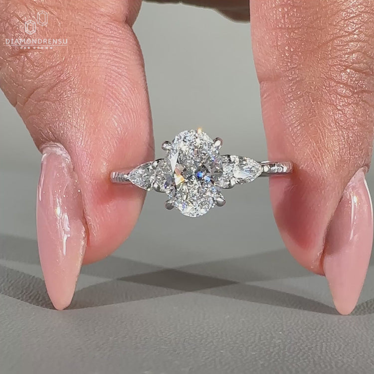 Oval shaped diamond ring set in a sleek band.
