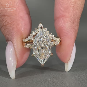 Marquise side stones complement this Dutch marquise wedding ring.
