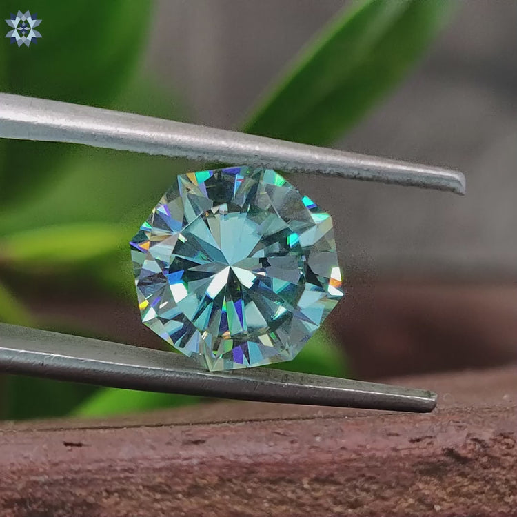 Moissanite stone in rare cyan blue loose moissanite look.
