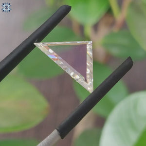 Moissanite stone available in triangle portrait cut.
