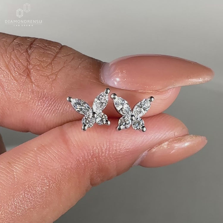 Marquise and round diamond earrings for a sparkling touch.
