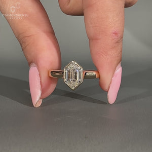 Solitaire setting on a classic hexagon diamond ring
