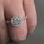 Round Lab Grown Diamond Halo Engagement Ring With Marquise Pave