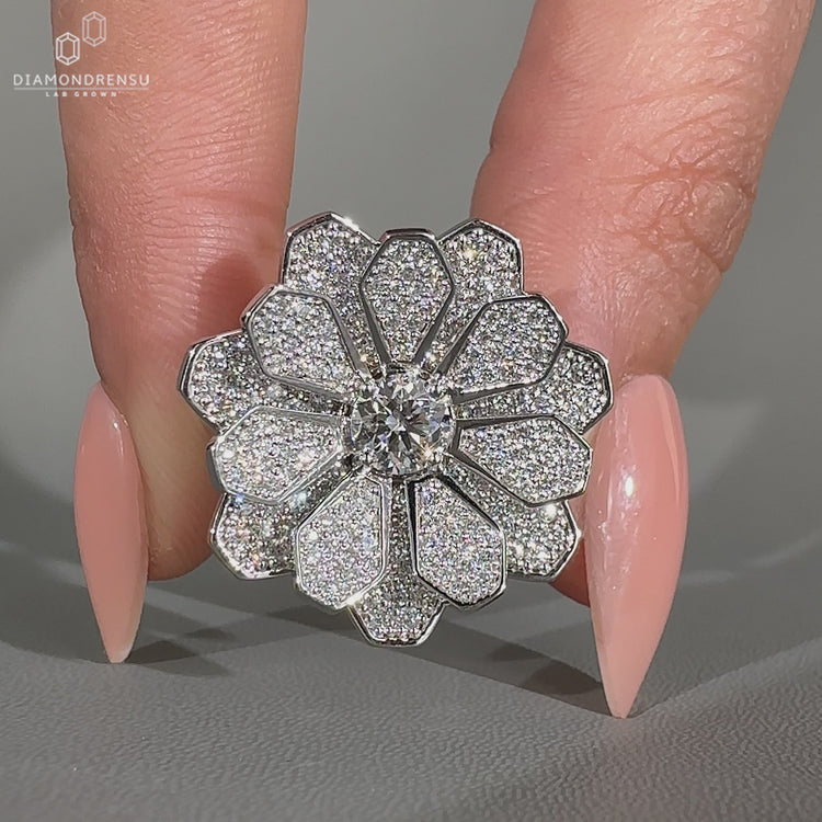 Custom handmade cluster engagement ring with round diamonds in nature inspired style.