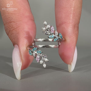 Round pearl band with aqua sapphire stone in white gold.
