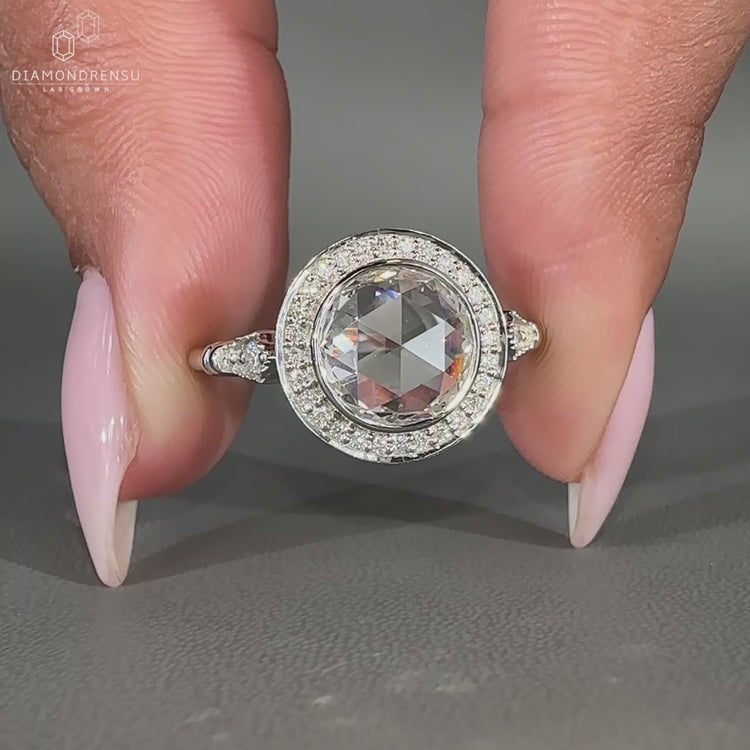 Bezel setting holds the round rose cut diamond securely in place.
