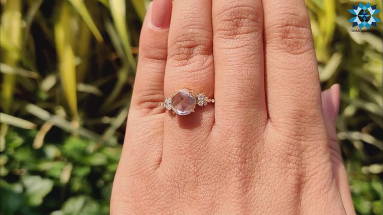 Round rose cut ring featuring a 4 claw prong setting.
