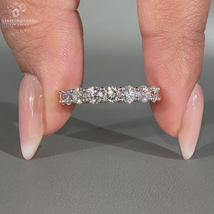 Round diamond wedding band featuring brilliant stones for a radiant look.
