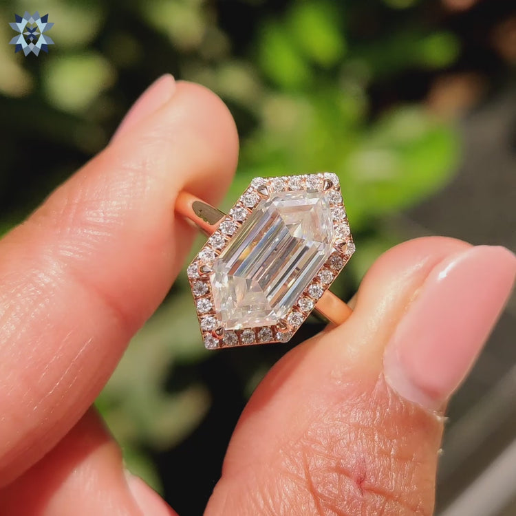 Moissanite halo ring with 6 prong claw setting.
