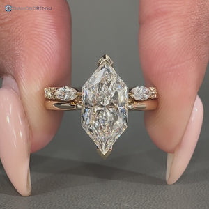 Diamondrensu handmade Dutch marquise wedding ring with half eternity style.