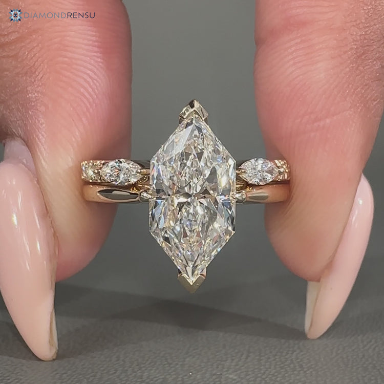 Diamondrensu handmade Dutch marquise wedding ring with half eternity style.