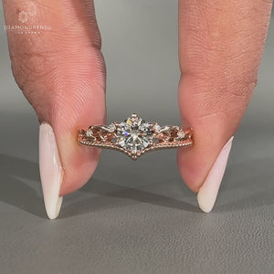 Vintage style ring with round side diamonds.
