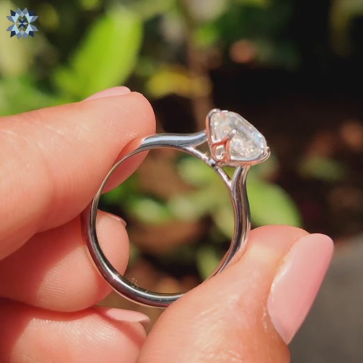 White gold solitaire setting with hexagon-shaped diamond
