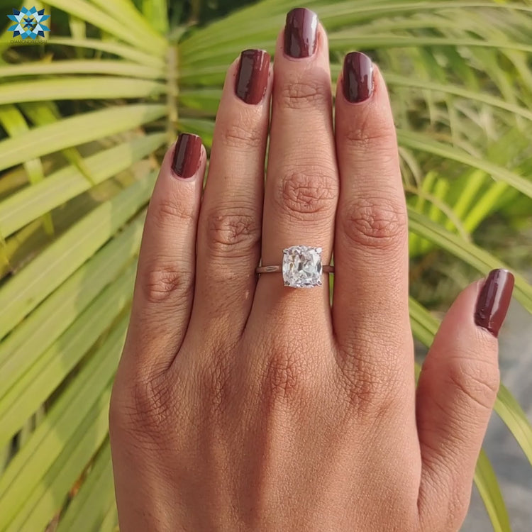 Elegant hidden halo moissanite engagement ring design.