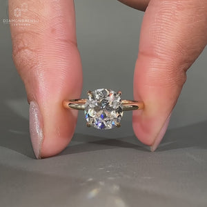 OMC cushion cut diamond in a solitaire ring.
