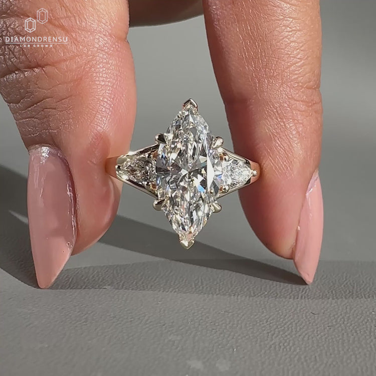 3 Stone Marquise Ring with a unique and elegant design.