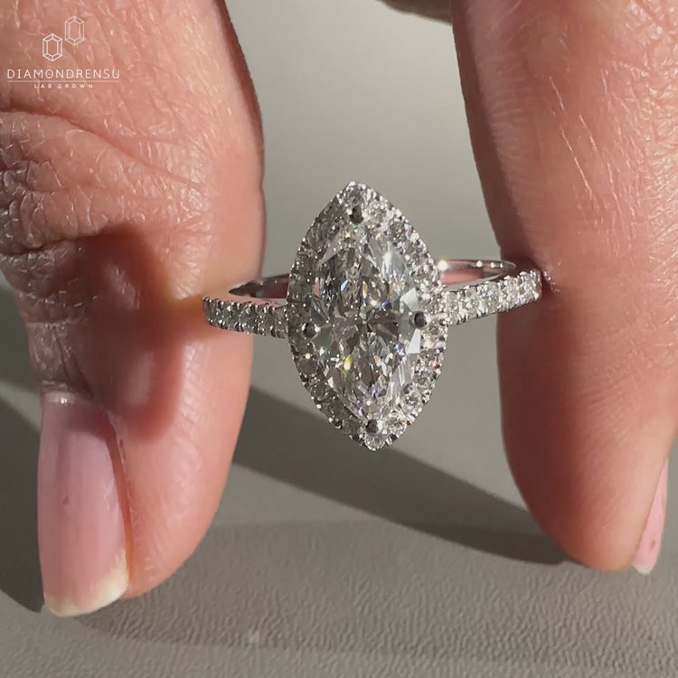 This ring features a halo setting and a pave setting for extra sparkle.
