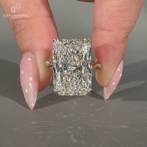 Radiant cut lab grown diamond ring in trellis setting.
