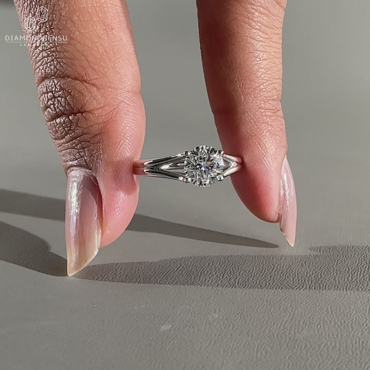 Solitaire Ring featuring a brilliant round cut diamond.