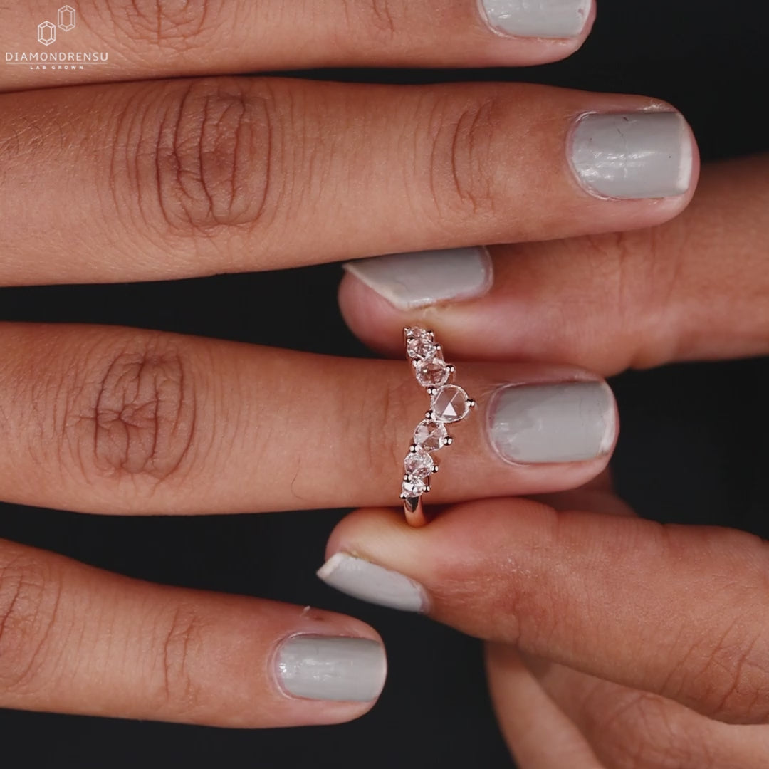 Close-up of a rose cut diamond wedding band, highlighting its unique faceted design.