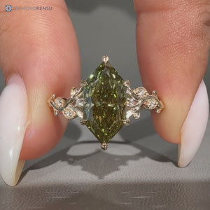 Green Dutch marquise diamond ring with round side stones.