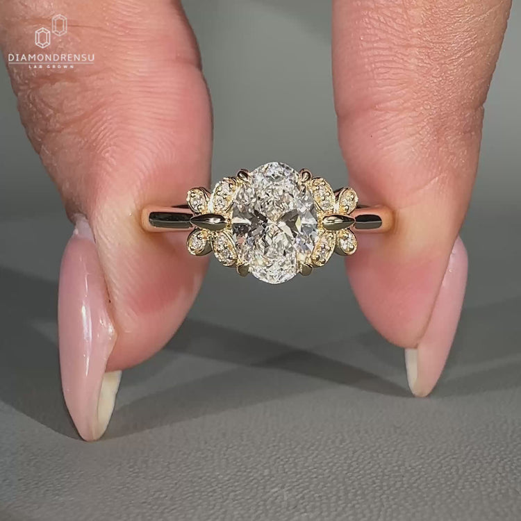 Elegant halo oval ring engagement with sparkling diamonds in a timeless setting.
