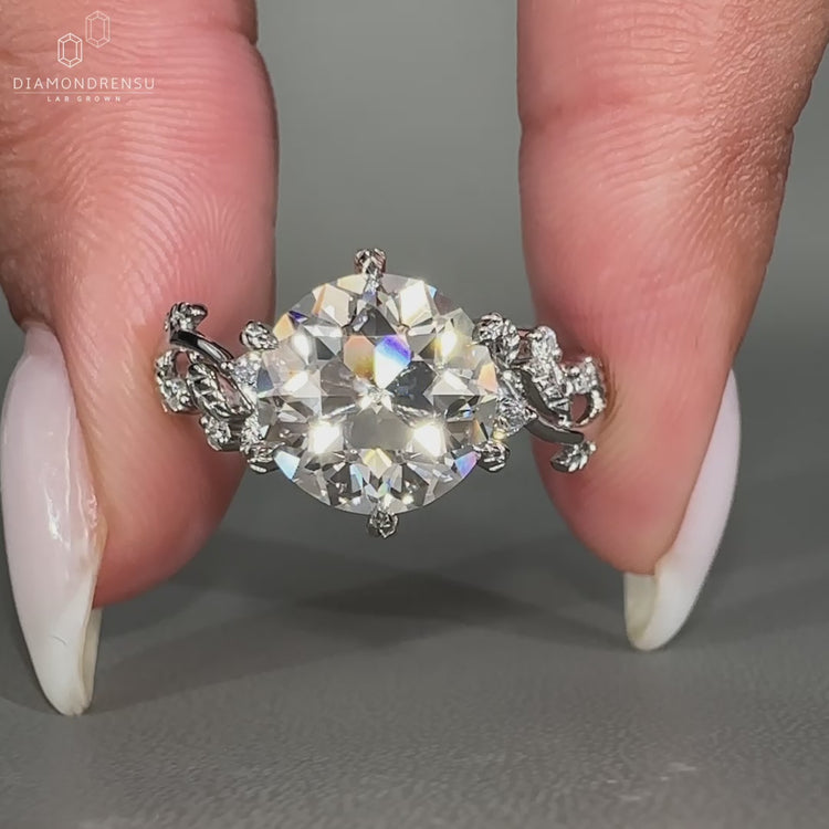 Round old European cut ring showcasing classic charm.
