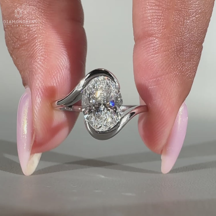 Round cut side stones add sparkle.
