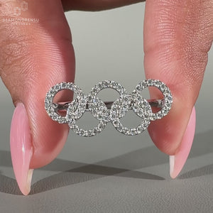 Round diamonds set evenly across the Olympic-style band.
