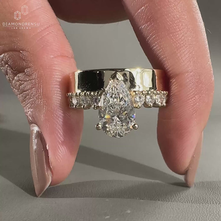 Pear Cut Engagement Ring with pave setting for extra sparkle.