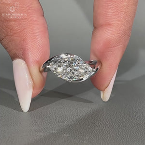 East to West marquise engagement ring.
