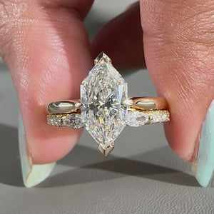 Dutch Marquise Diamond set in a stunning wedding band.
