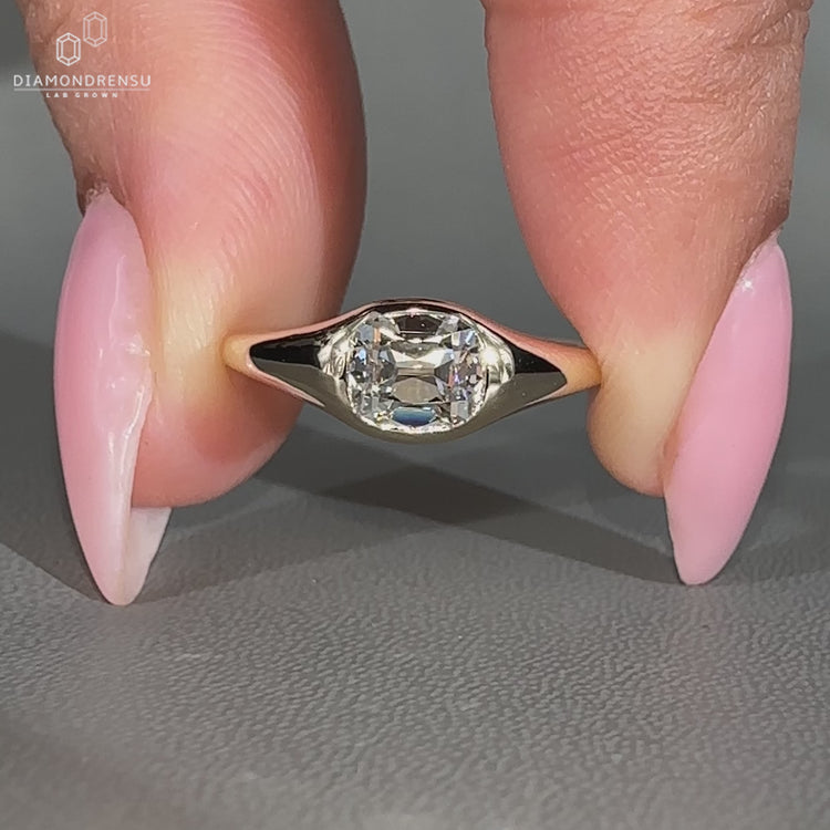 Handmade lab grown diamond ring with flush east to west design.
