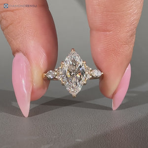 Marquise and round side stones paired with a seven stone style.