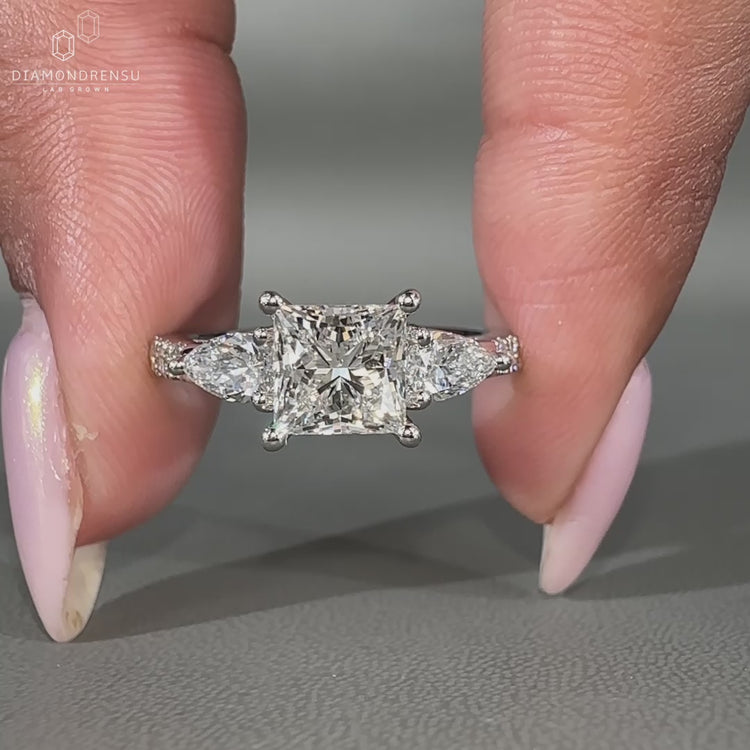 Princess cut diamond ring designed with pave setting ring in Lab Grown Diamond style.
