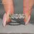 Lab grown oval diamond wedding band with shared prong setting.