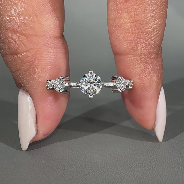 5 Stone Engagement Ring featuring brilliant round diamonds.