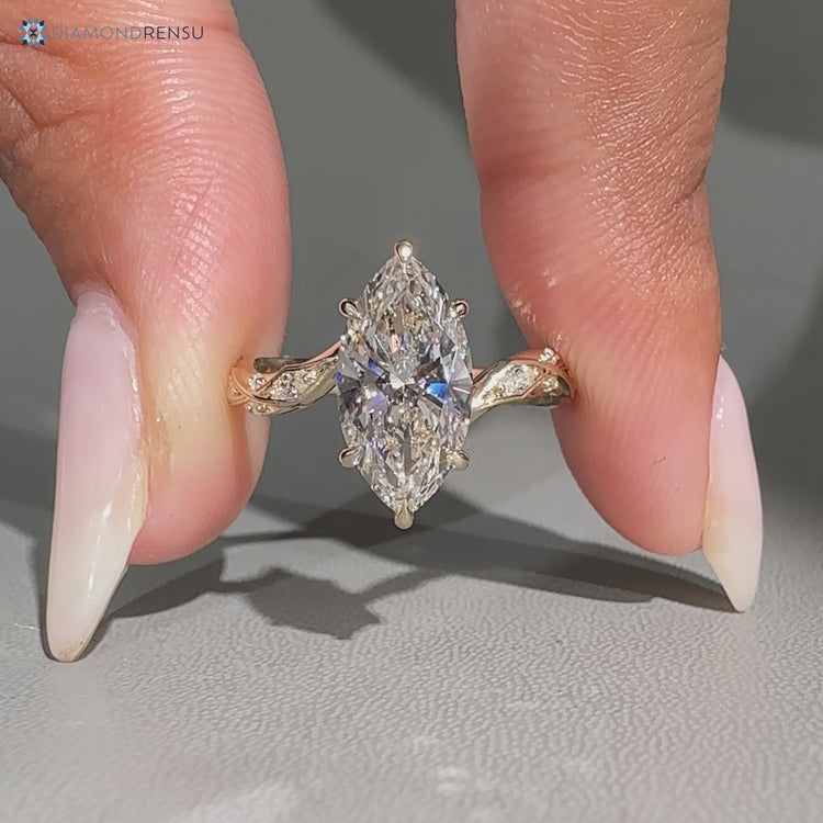 Marquise engagement ring with a bypass setting.